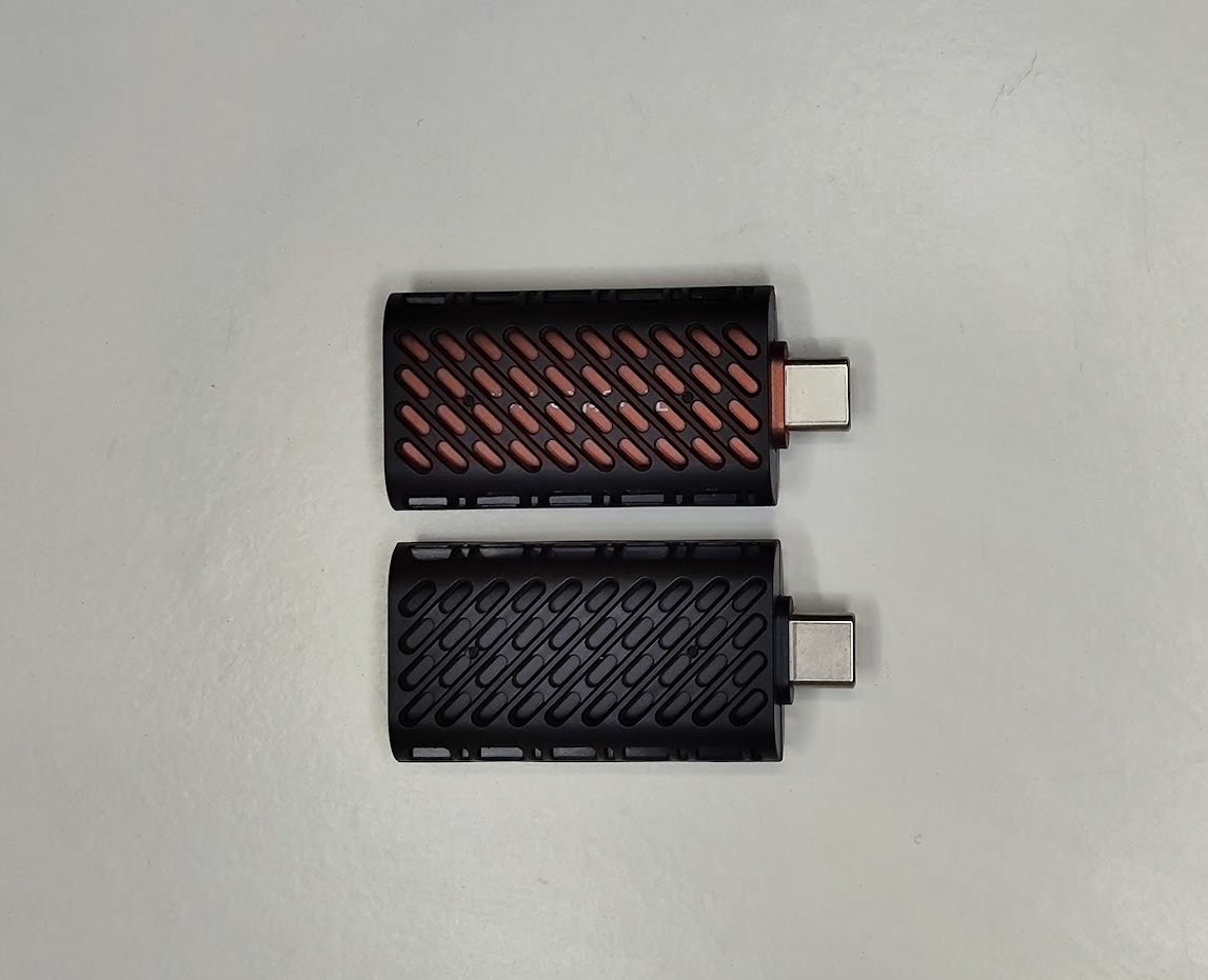 both sticks with sleeves side by side both sticks with sleeves side by side